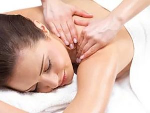 A woman receiving a relaxing massage